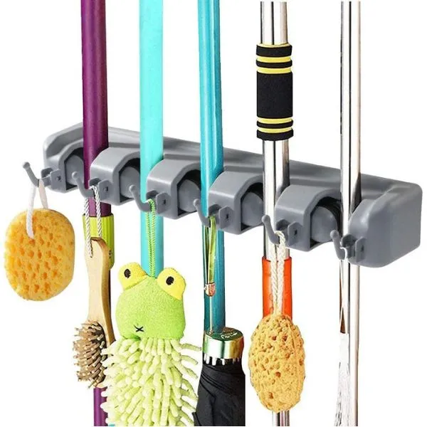 one tidy spot for your brooms and bathroom essentials